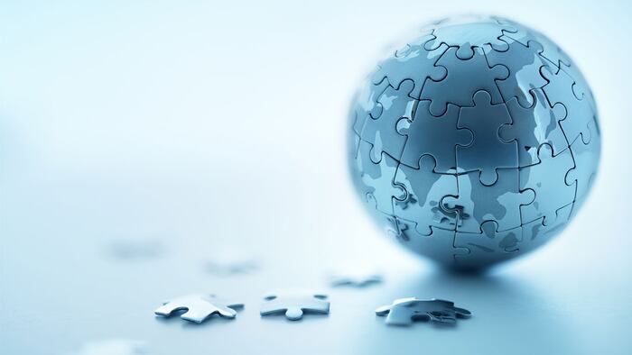 Global strategy solution concept - earth jigsaw puzzle